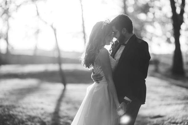 istock Newlyweds dancing in sunny park 2181132284