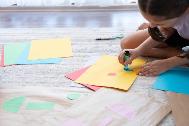 istock Cute little girl making art 2181132319