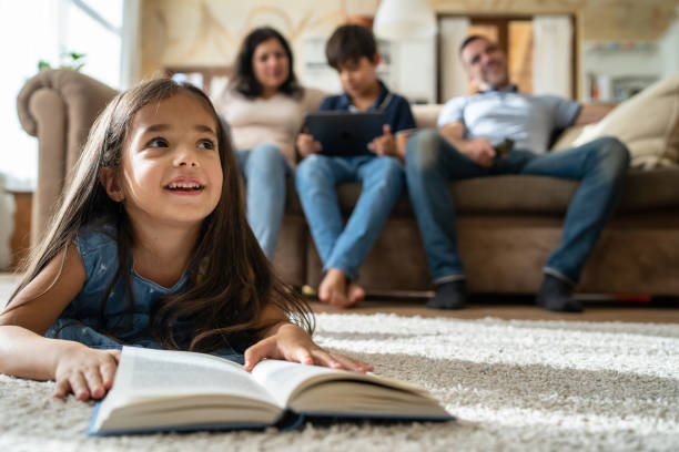 istock A smiling girl with a story book 2181134915