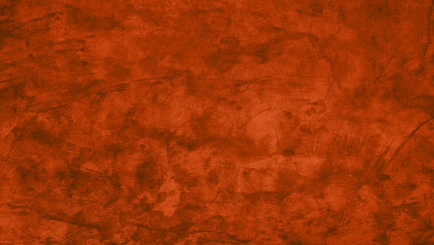 istock grunge red stucco cement texture background, natural matt concrete texture for interior or exterior home decoration. abstract rustic facade surface for design. 2181137142