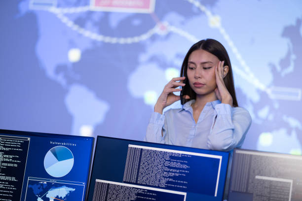 istock Concerned Female Cybersecurity Manager in Enterprise Cyber Security Operations Center SOC working with a security breach 2181137166