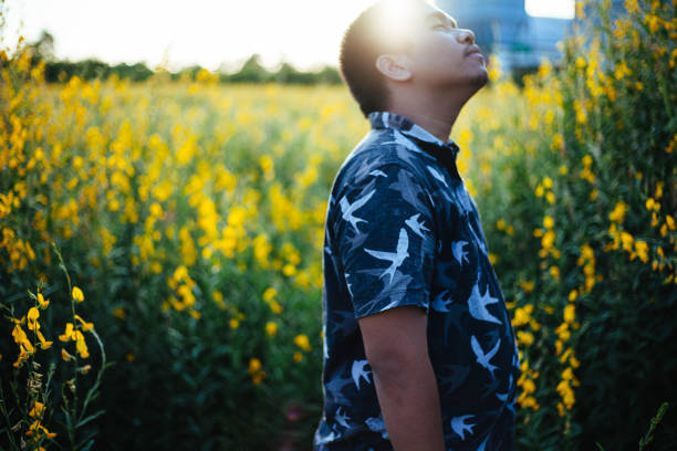 istock man in flower field 2181137356