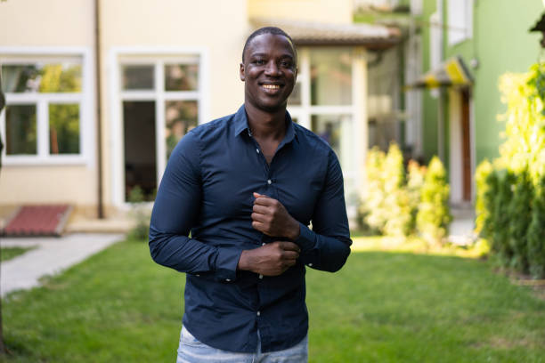 istock Confident smartly dressed man smiling at the camera 2181140838