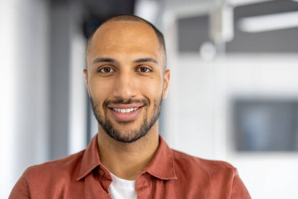 istock Business professional with confident smile in modern office environment conveying approachability and professionalism 2181143040