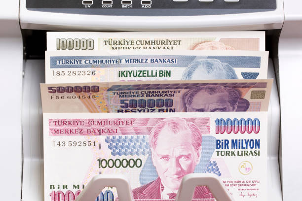 istock Old Turkish Lira in the counting machine 2181144416