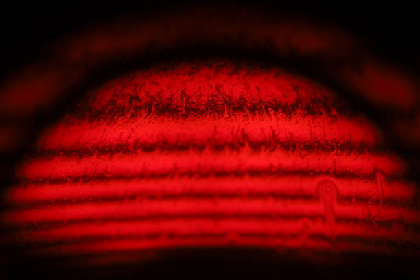 Red fantastic lines, red liquid on a dark background, colourful abstract, line of light, red on black, surrealistic art