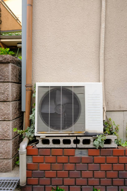 istock A white air conditioning unit on the outside wall of a building 2181156847