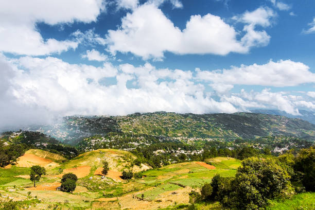 istock Mountain Majesty: Where Clouds Meet Cultivated Hills
