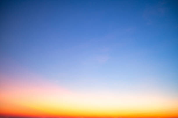 istock Beautiful , luxury soft gradient orange gold clouds and sunlight on the blue sky perfect for the background, take in everning,Twilight, Large size, high definition landscape photo 2181165373