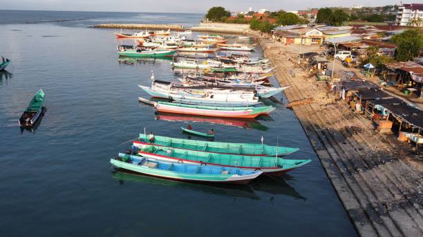 istock Fishing boats on the beach 2181188145