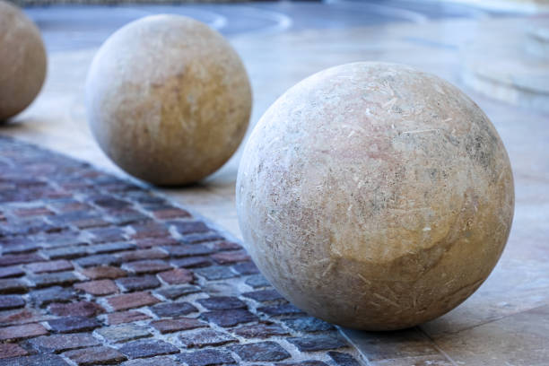 istock The composition of three marble spheres is located on a granite floor, the structure and texture of the first sphere is clearly visible. 2181190605