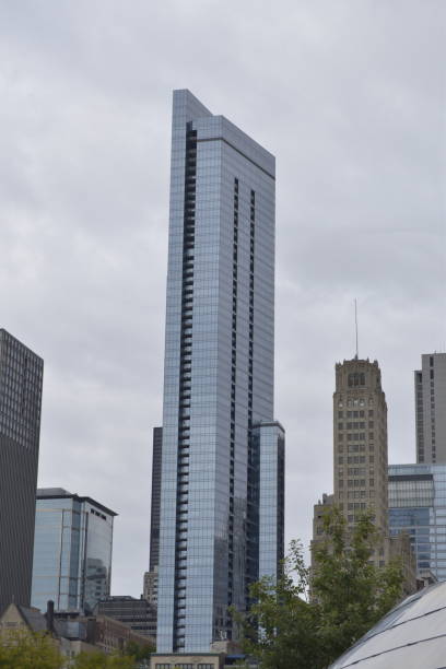 istock Tall Modern Skyscraper Surrounded By Shorter Skyscrapers 2181193808