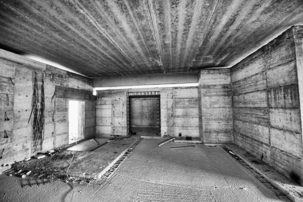 Interior of a construction site, large empty room.