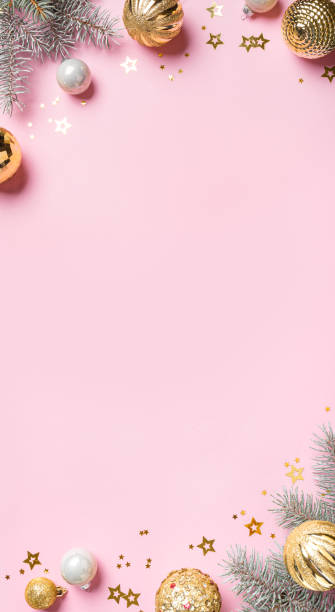 istock Christmas Pink Background with golden baubles 2181203947
