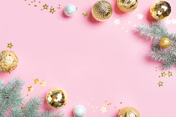 istock Pink Christmas Background with pine branches and golden decor 2181204038