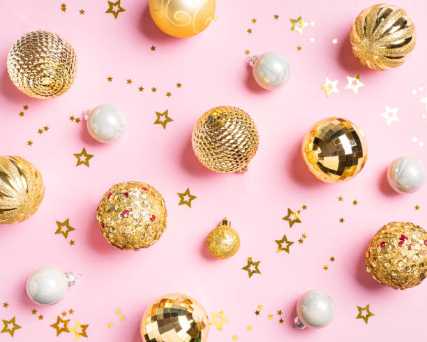istock Christmas shine golden baubles background 2181204078