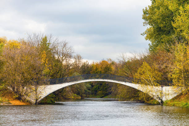 istock arched bridge in autumn park, no people 2181208946
