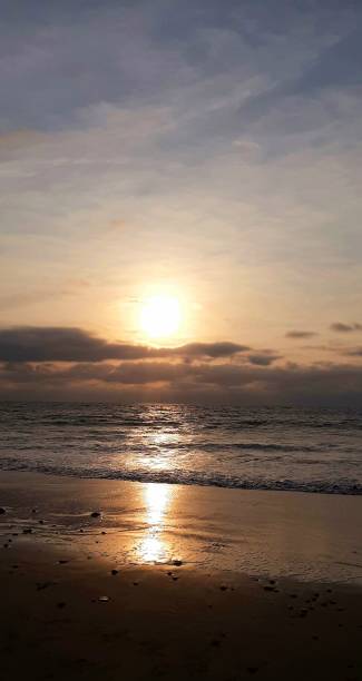 istock sunset in front of the sea 2181209922