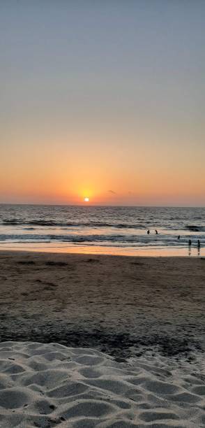 istock orange sunset with various types of sand 2181209942