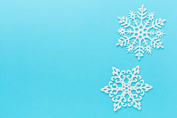 istock Beautiful snowflake on color background, top view 2181211958
