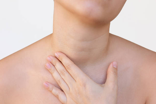 istock young woman touching her neck demonstrating lines on it with her hand 2181214298