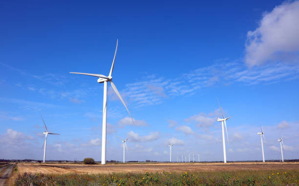 istock wind turbines are used to generate electricity using wind power on cultivated plains 2181214546