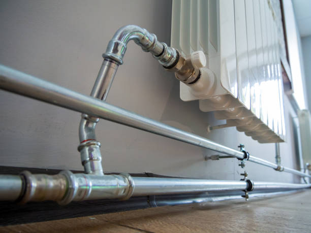 istock Fragment of a heating system using stainless steel pipes 2181216556