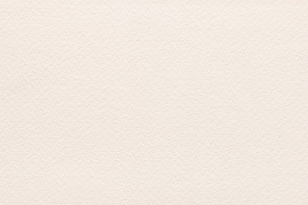 istock Textured beige cardboard paper background. Horizontal embossed paper background 2181217760