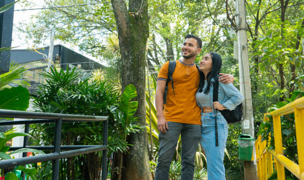 istock young couple walking through provenza medellin. 2181221554