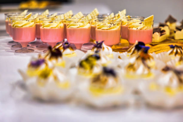 strawberry with white chocolate mousse , cake mini with edible flowers, patisserie lemon tart meringue, mousse