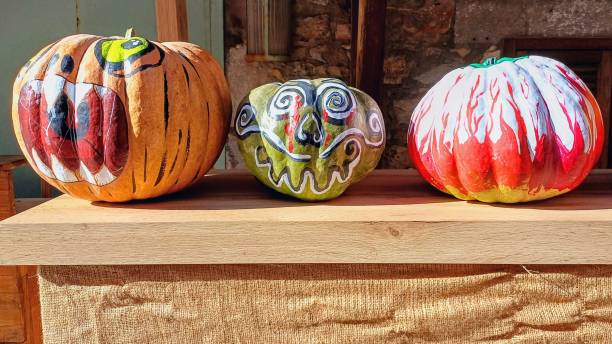 istock scary. painted pumpkins. Halloween. 2181227205