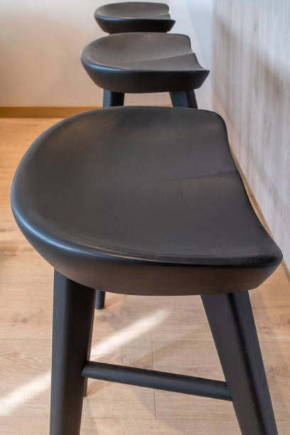 istock Modern design black chairs in a living room 2181235012