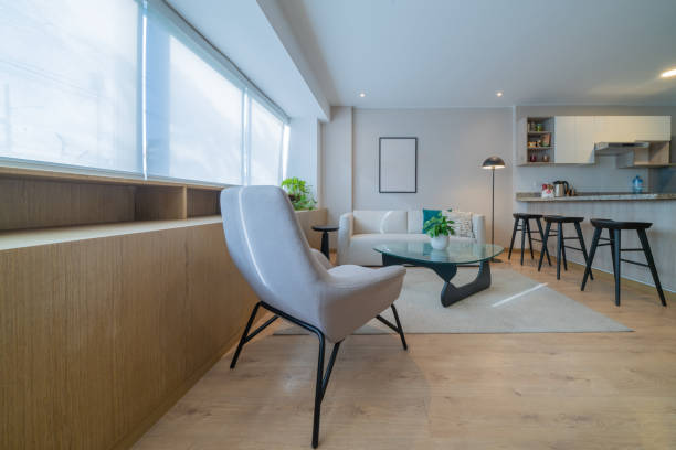 istock Luminous living room with chair, sofa and crystal table 2181236679