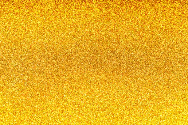 istock Golden Sparkling Glitter Background with Sparkling and Reflections 2181239363