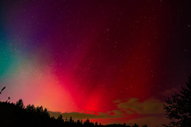Vilach, Austria - May 11th, 2024: Very rarely seen polar lights painted a colorful sky around the city of Villach in Southern Austria.