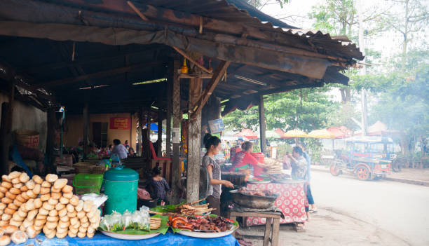 Luang Prabang, Laos - April 8, 2011: Local people and street life activity in the streets of Luang Prabang