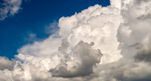 istock Blue sky with white summer rain clouds. Colorful summer landscape 2181247356