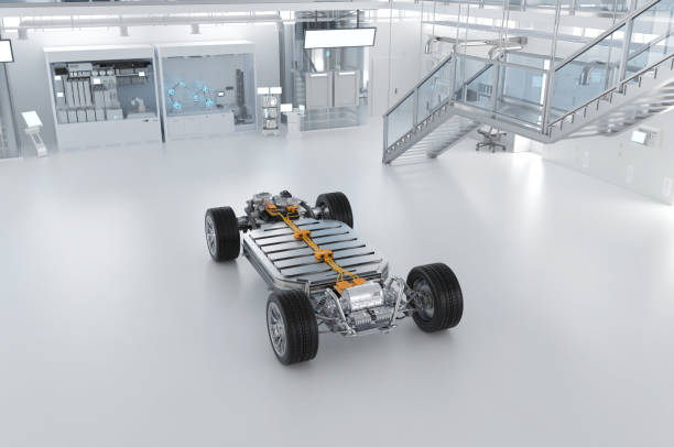 istock Ev car with pack of battery cells module on platform in laboratory 2181250379