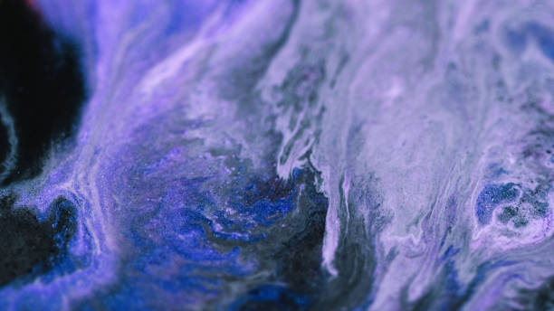 istock Liquid glitter flow wet acrylic spill blue black 2181251105