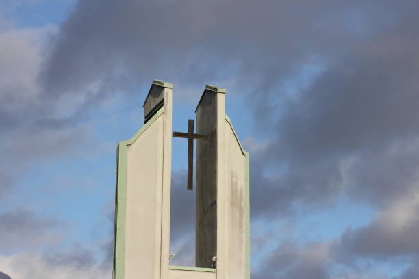 istock A cross on a church with stormy clouds around it 2181259157