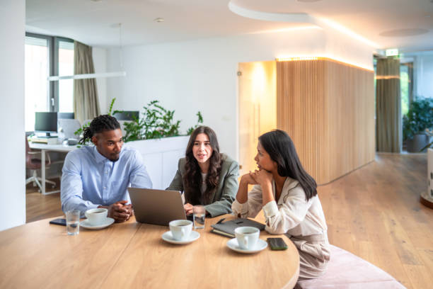 istock Diverse Business Team Engaging in Strategy Session in Modern Workspace 2181263770