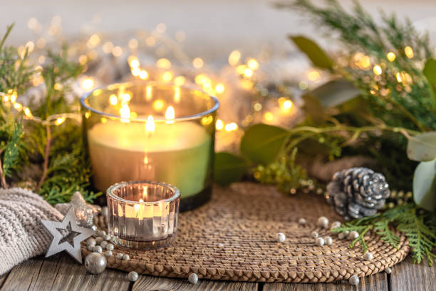 Cozy Christmas composition. Christmas candle.