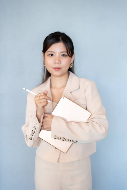 istock The Asian female executives ability to connect with her team on a personal level has created a strong sense of loyalty and commitment, vital for sustaining our company's long-term business goals. 2181273114