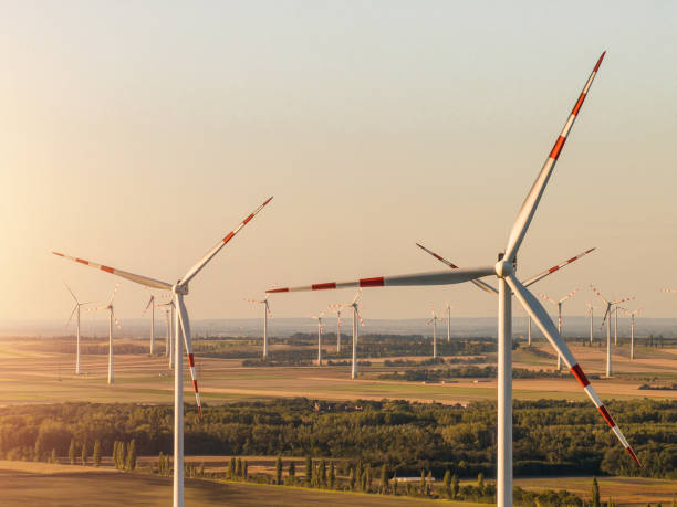 istock Aerial view of wind turbines on sunset. 2181275326