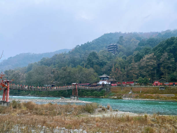 istock Scenic Footbridge Over Turquoise River 2181275449