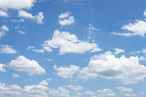 istock Beautiful blue sky with soft white clouds background 2181278434