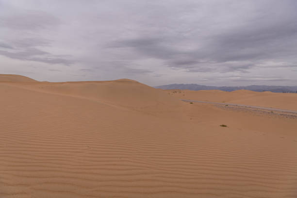 The background image of the sand texture created by the wind, erosion, copy space for text