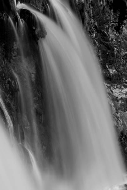 istock beautiful waterfall in the mountain 2181284440
