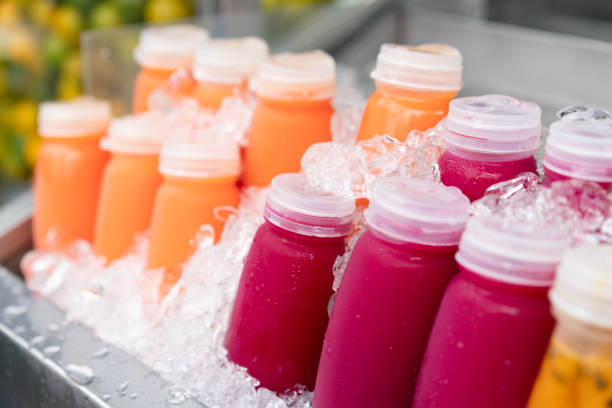 istock close up mixed ice cold juice bottle. 2181287922