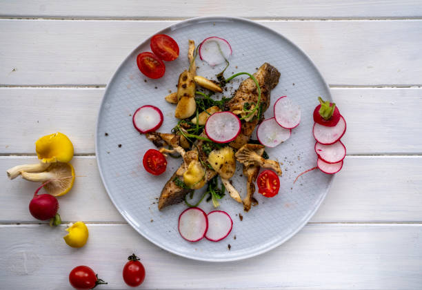 mushroom, tomato, radish, parsley, pan fried cod fillet